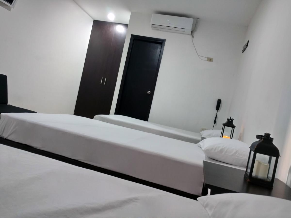 Hotel El Emigrante Пуэрто-Коломбия Экстерьер фото