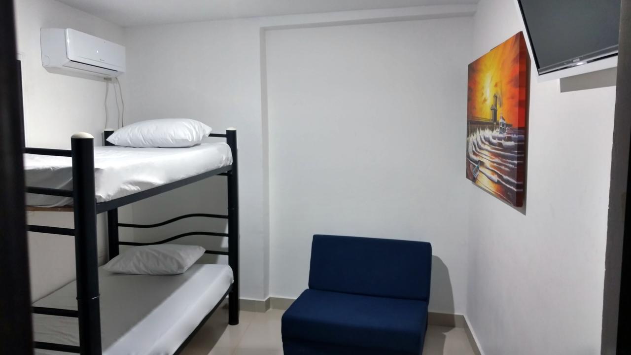 Hotel El Emigrante Пуэрто-Коломбия Экстерьер фото