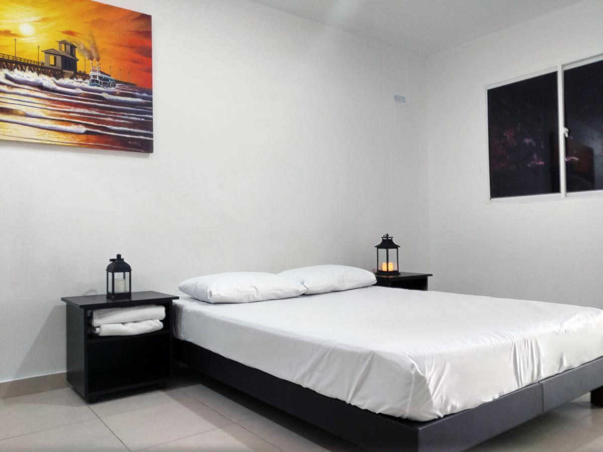 Hotel El Emigrante Пуэрто-Коломбия Экстерьер фото