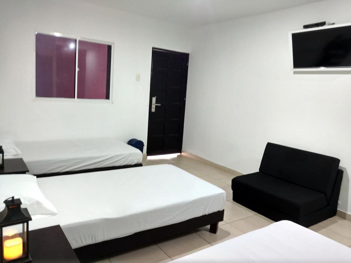 Hotel El Emigrante Пуэрто-Коломбия Экстерьер фото